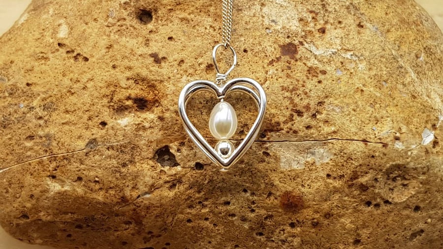 Fresh water pearl heart pendant necklace. June Birthstone