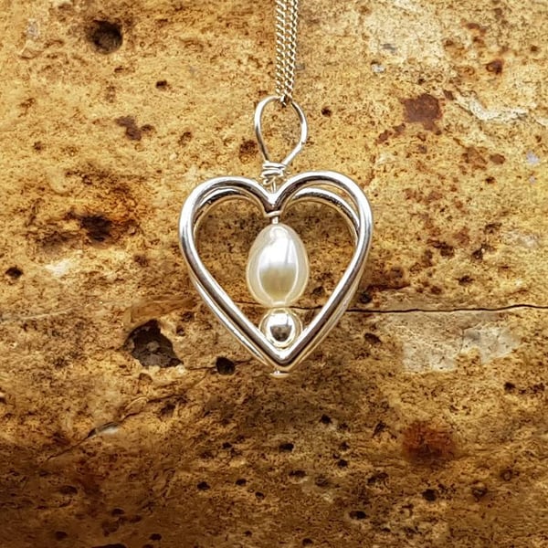 Fresh water pearl heart pendant necklace. June Birthstone