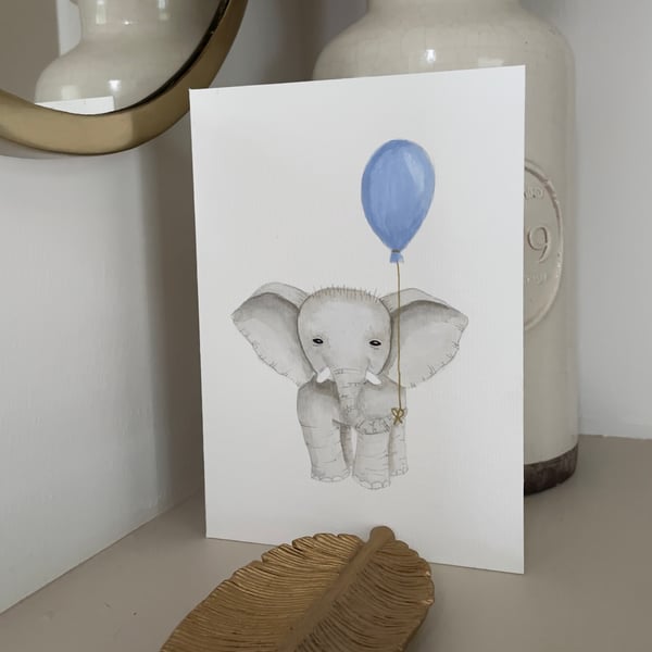 Hand painted baby elephant with blue balloon greeting card