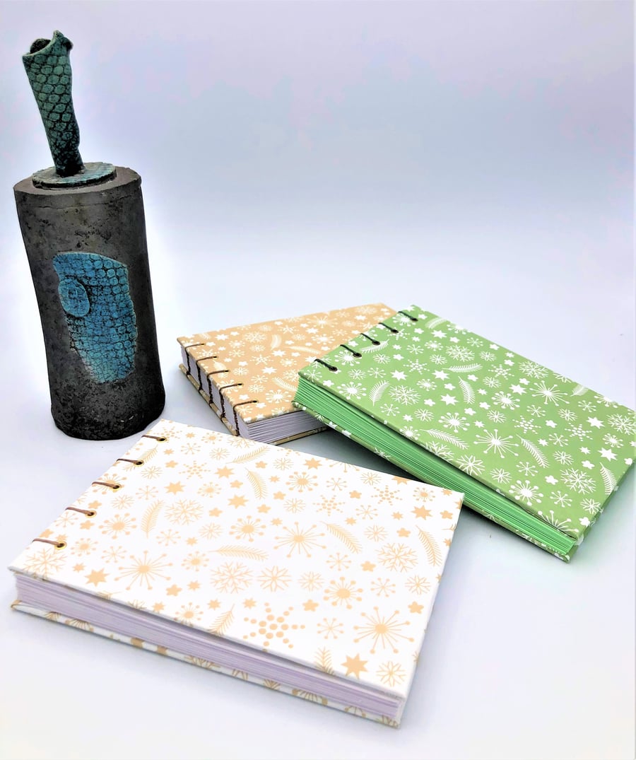 Snowflakes A6 Pocket Notebook - a selection of colours 