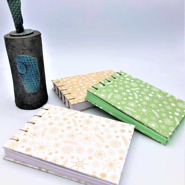 Snowflakes A6 Pocket Notebook - a selection of colours 