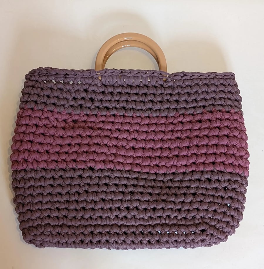 Handmade crochet bag with handles made with plum coloured t-shirt yarn