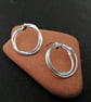 Modern hammered silver circles stud earrings - Image 1