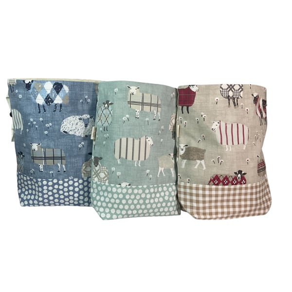Two at a time knitting bag with tartan plaid sheep, blue sock sack, drawstring