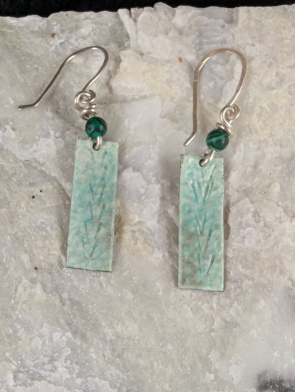 Silver drop earrings, patterned, with green enamel, and a malachite bead.