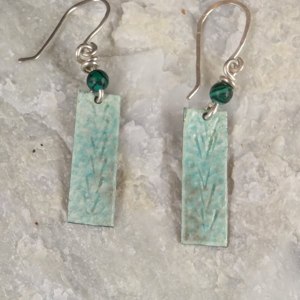 Silver drop earrings, patterned, with green enamel, and a malachite bead.