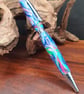Twist pen in painter pallette 
