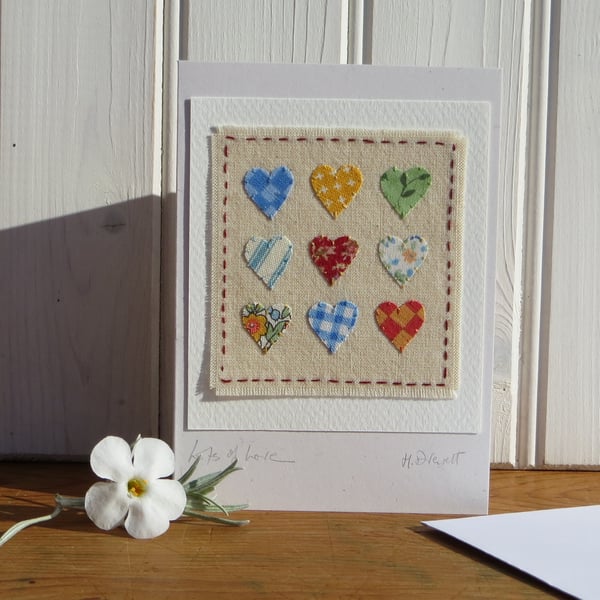 Miniature hand-stitched bright applique hearts - entitled 'Lots of Love'