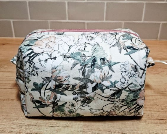 Boxed toiletry bag with pink cream and green florals