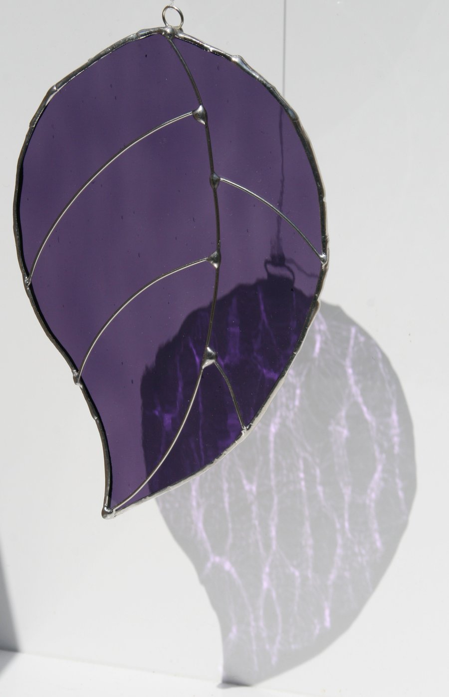 Magical purple stained glass leaf