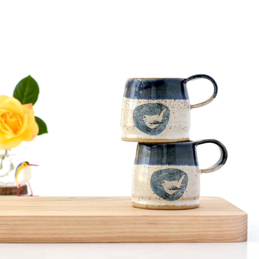 Handmade blue and white ceramic bird mug with wren image - stoneware pottery