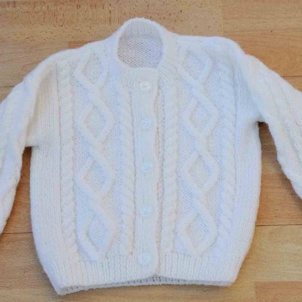 toddlers hand knitted cardigan in an aran style to fit age 1 to 2