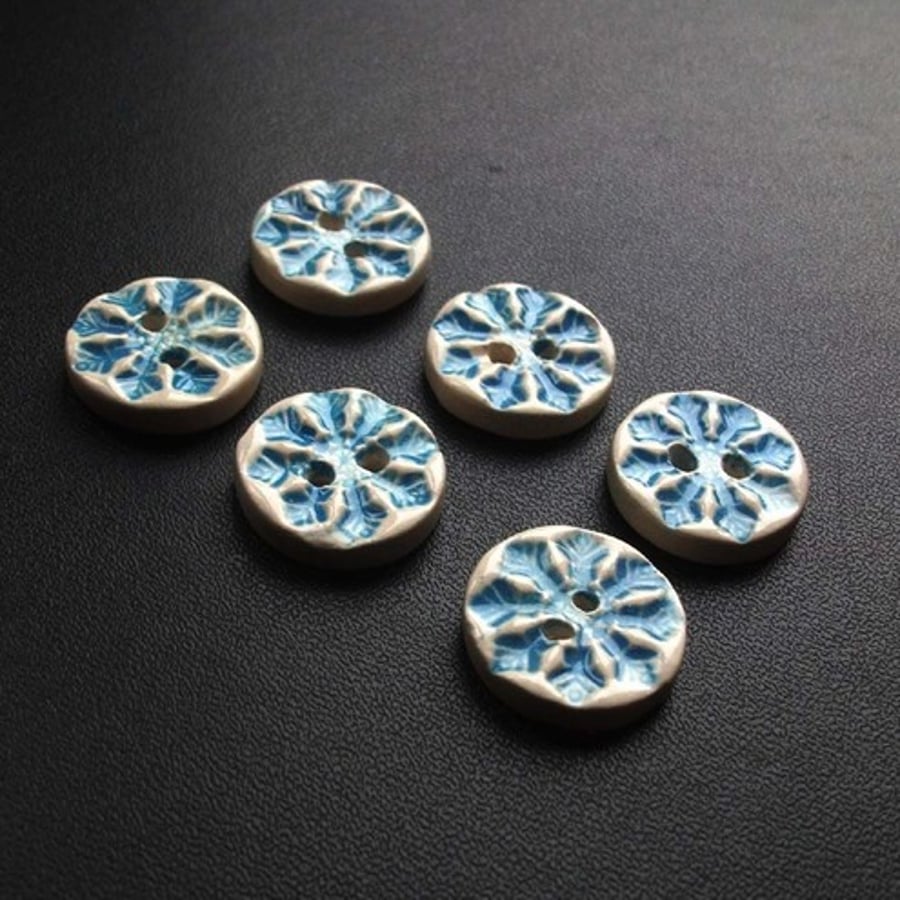 Set of six little snowflake buttons