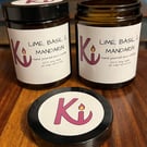 Lime, Basil & Mandarin scented soy candle in an apothecary jar