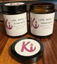 Lime, Basil & Mandarin scented soy candle in an apothecary jar