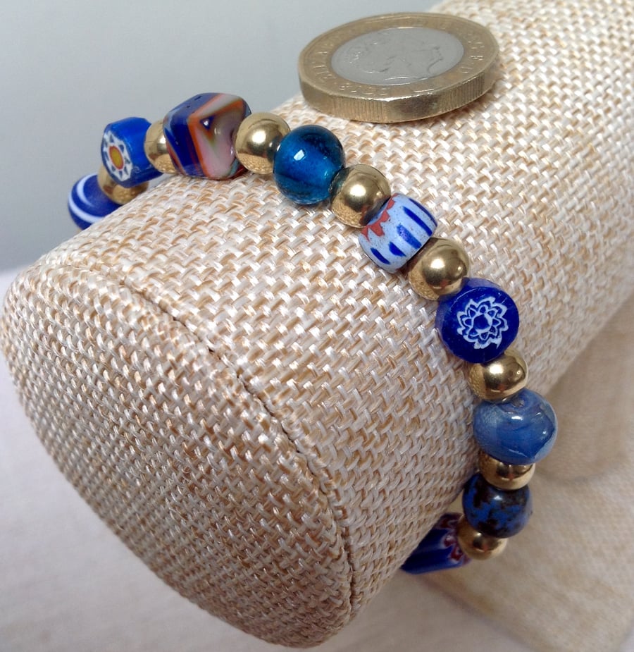 Bead collectors bracelet, blue and gold