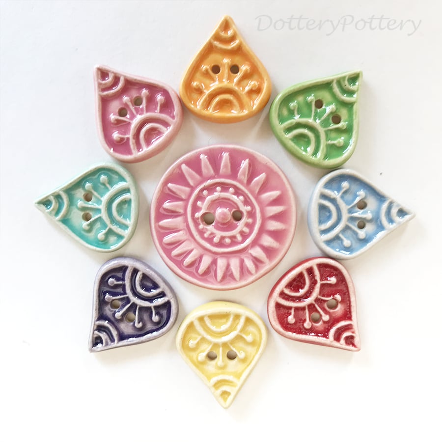 Set of nine fancy shaped ceramic handmade buttons