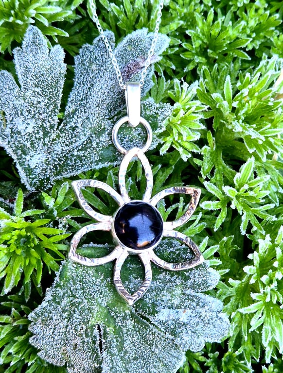 Sterling silver flower pendant with blue goldstone