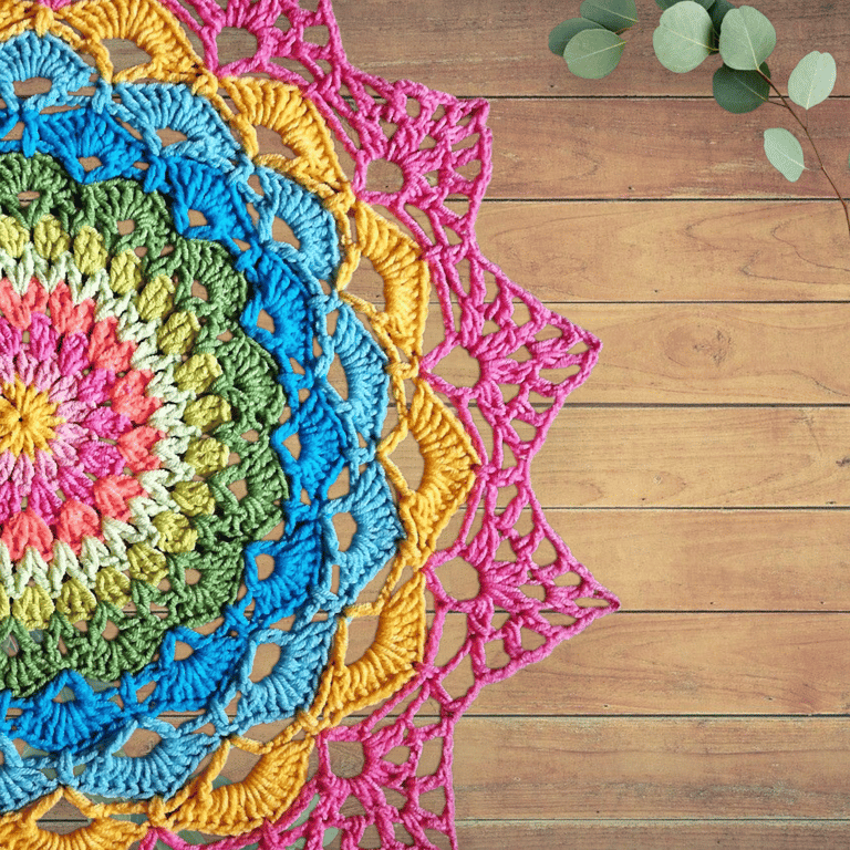 Large, bright crochet mandala doily table mat