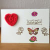 Flower, Butterfly and Crochet Heart Anniversary Card