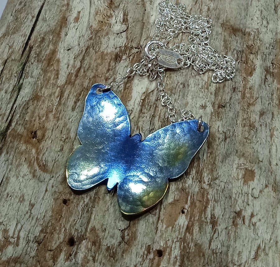 Coloured Titanium Blue and Golden Butterfly Necklace - UK Free Post