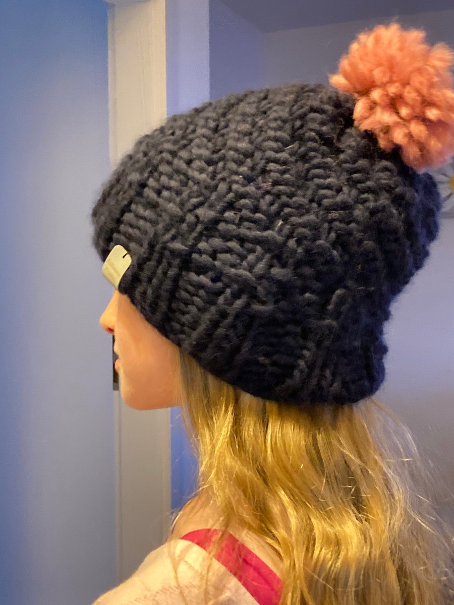 Hand knitted woollen bobble hat 