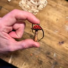 Hand Carved Red and Black Emo Mushroom Pendant 