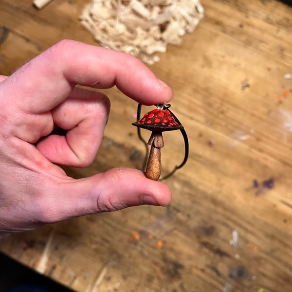 Hand Carved Red and Black Emo Mushroom Pendant 