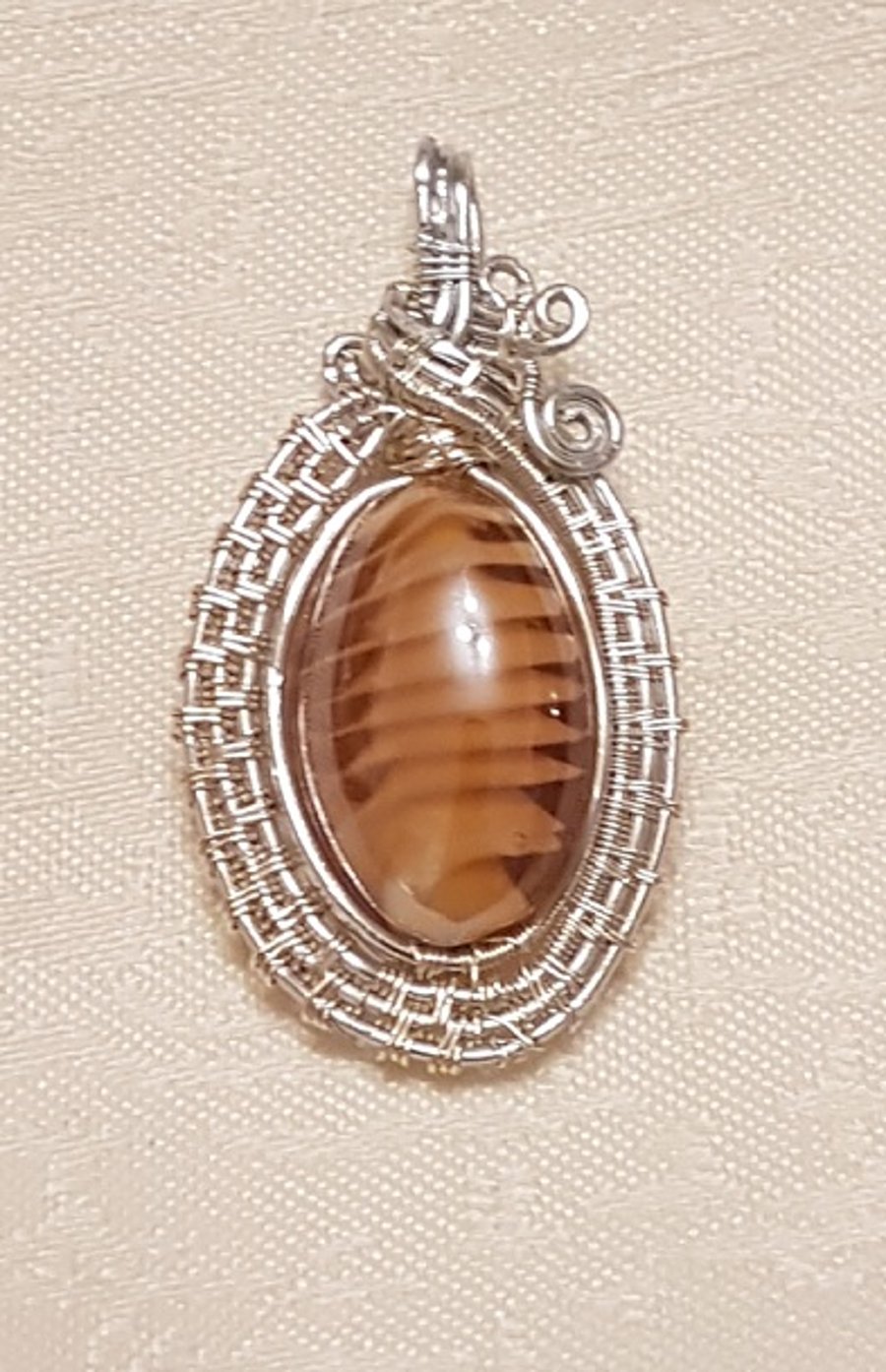 Beautiful Wire Wrapped Honey Glass bead with white swirl