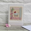 Pretty hand-stitched detailed miniature for precious new baby girl