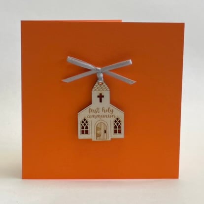 'First holy communion' card with detachable decoration