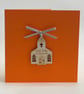 'First holy communion' card with detachable decoration