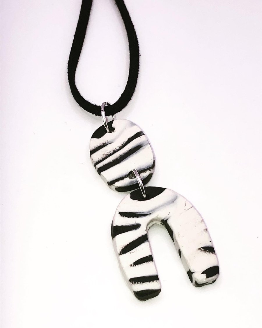 Zebra print inspired pendant