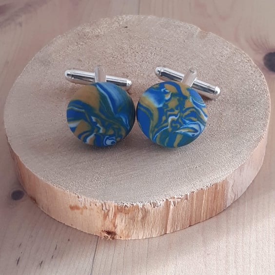 Men's handmade cufflinks in a blue and yellow swirl design with gift box