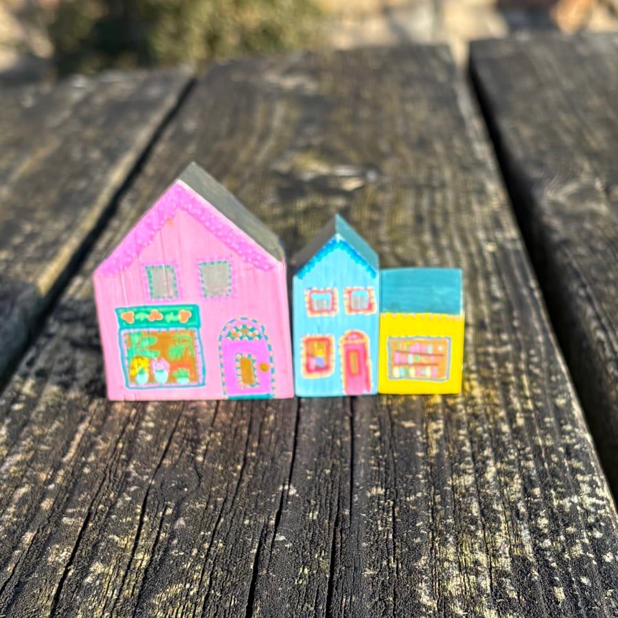 Parade of three little hand painted wooden shops - shelf ornaments