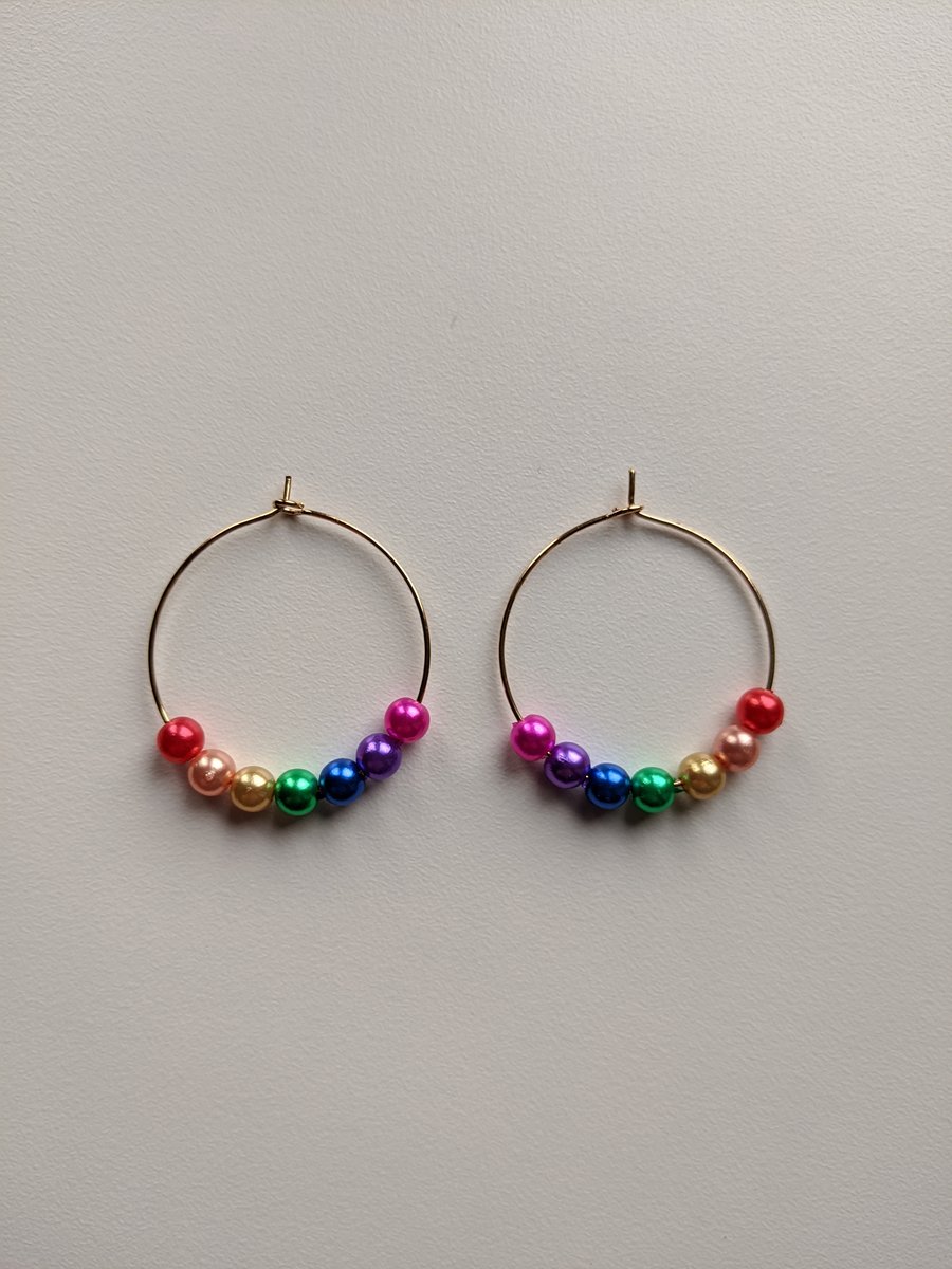 Bright rainbow bead hoops