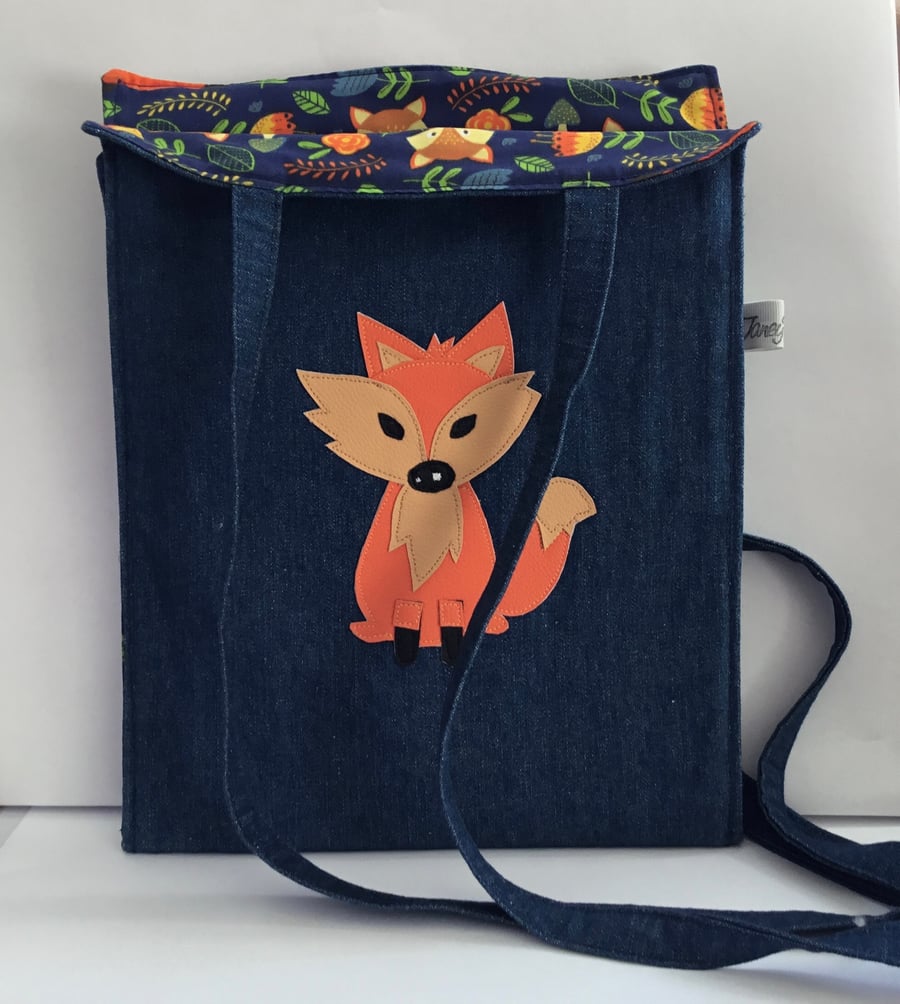 Denim post style denim bag.