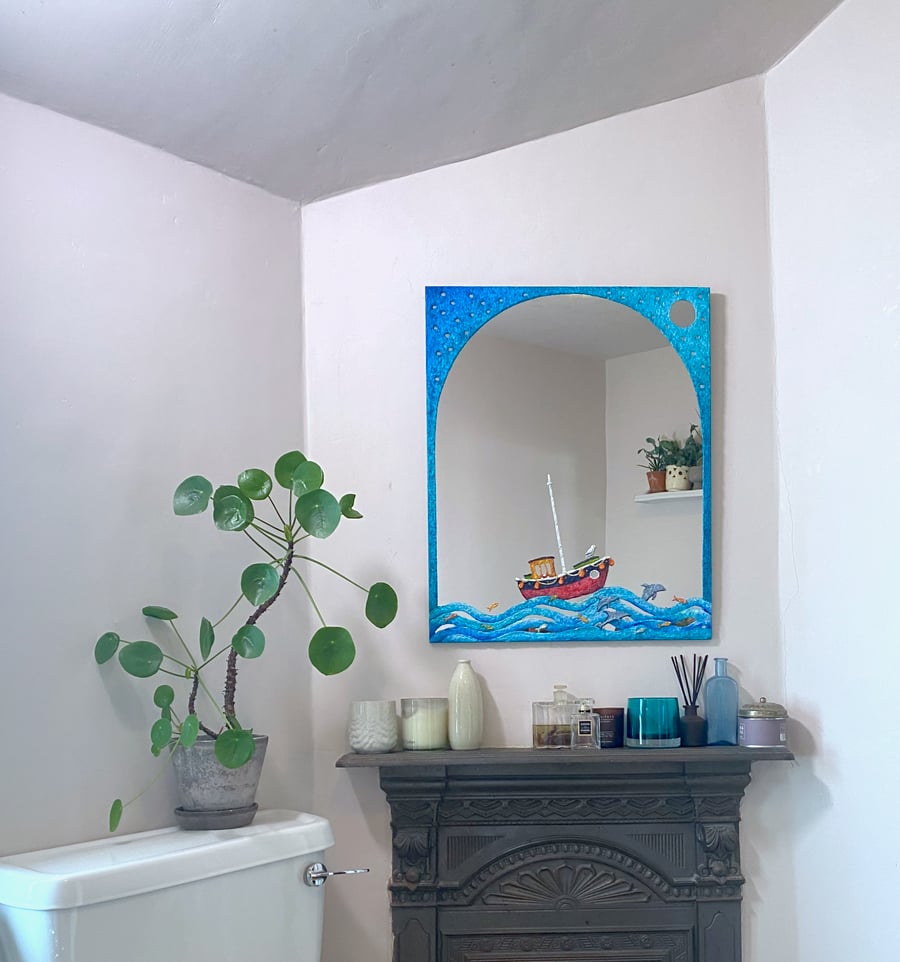 Red fishing boat mirror with dolphins and leaping fish under the stars and moon.