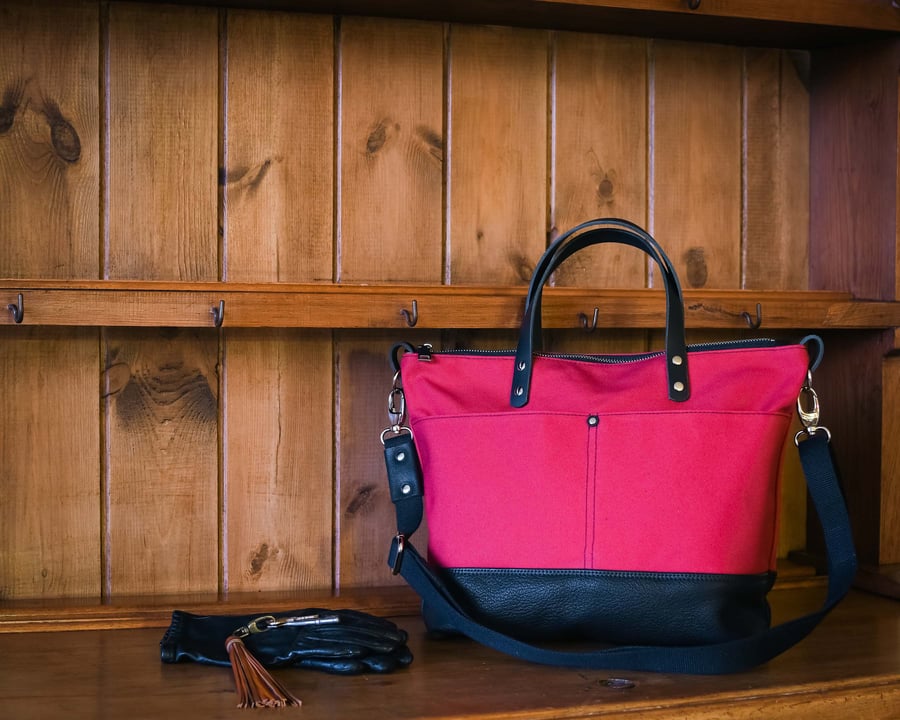 Raspberry pink canvas and black leather crossbody bag