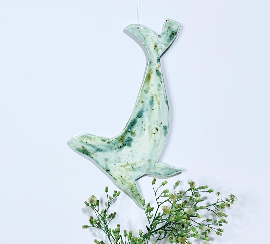 Ceramic seal hanging decoration glazed by hand and made in Norfolk