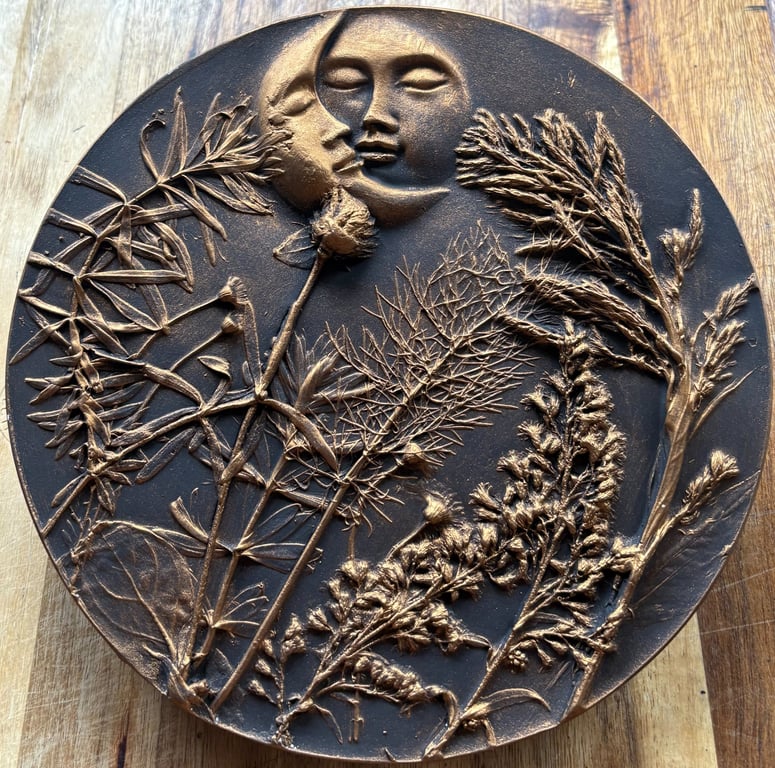 Wildflower and celestial themed botanical bas relief plaster wall hanging