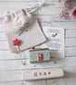 Little Wooden Painted House and Base in a Bag
