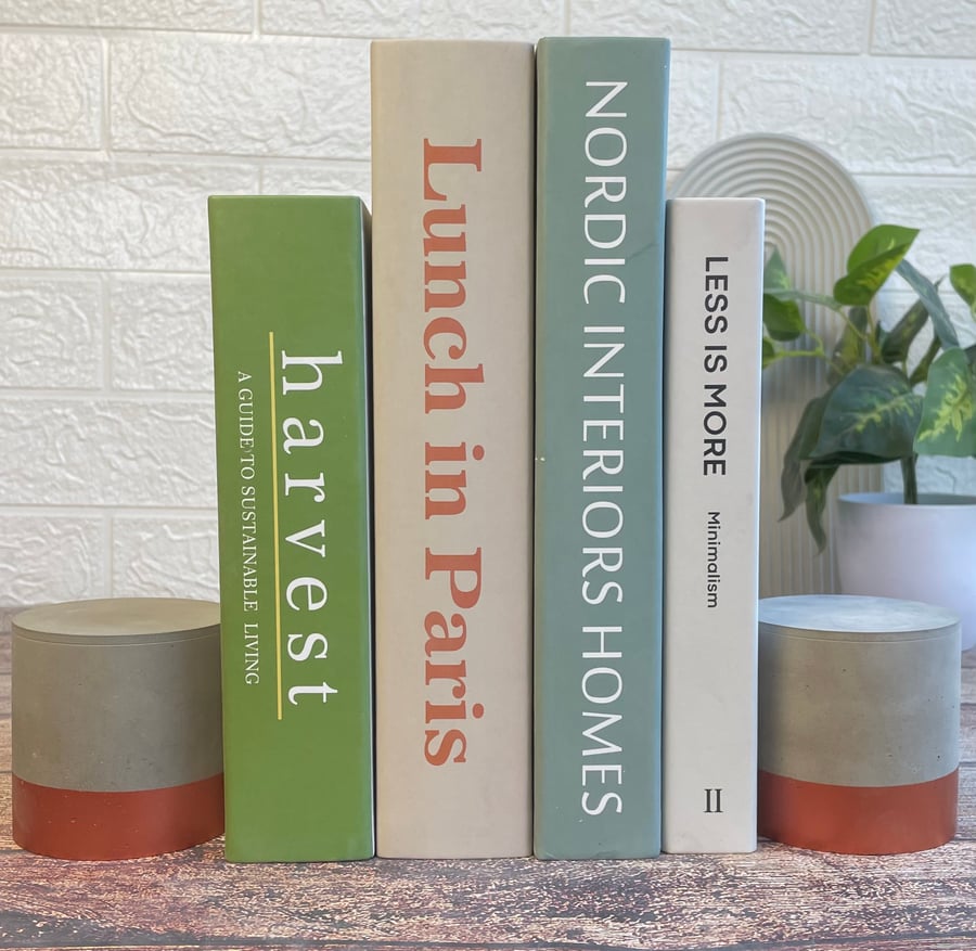 Concrete cylinder bookends with copper design 