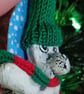 Christmas tree decoration of a Seal, airdry clay with a fabric hat and scarf.   - Image 4