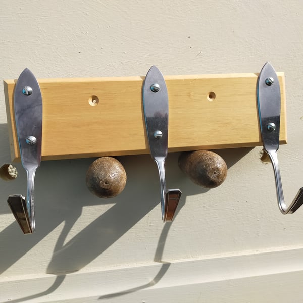 Fish knife towel hooks.