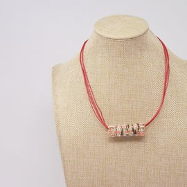Fabric bead necklace with waxed cotton cord 