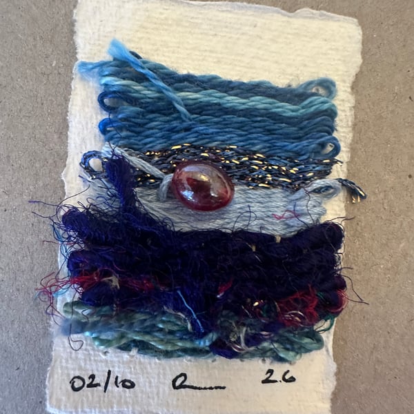 Beaded miniature weaving on card 2 of 10