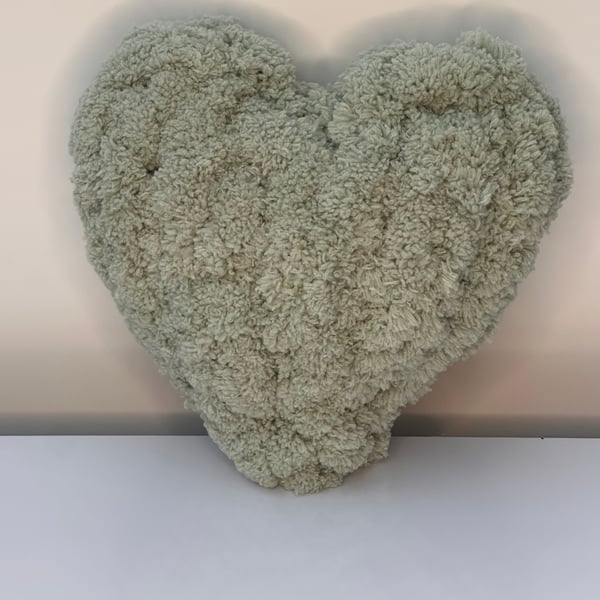 Soft hand knitted cushion