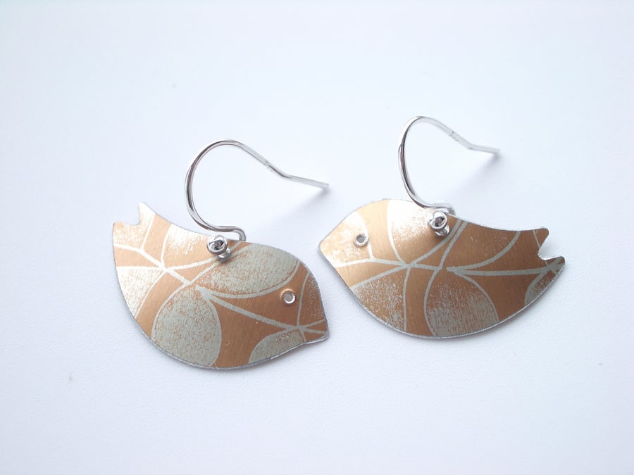 Bird earrings in dusky orange with leaf print
