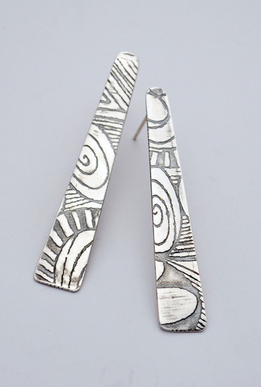 Flat silver stud drop earrings